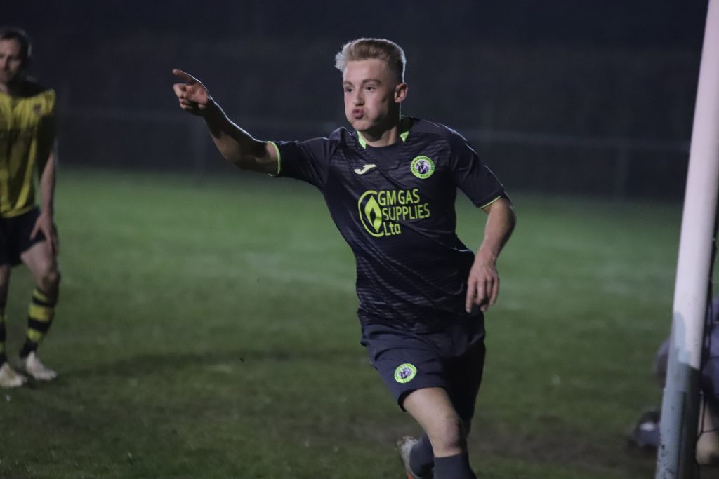 Sam Jones celebrates his first goal against Taffs Well