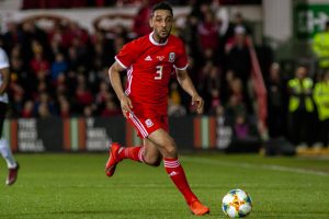 Neil Taylor playing for Wales against Trinidad & Tobago