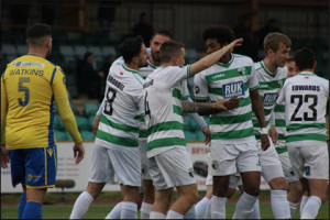 TNS celebrate Greg Draper's goal against Barry Town United