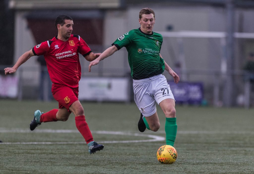 Aberystywth and Newtown battle for the ball