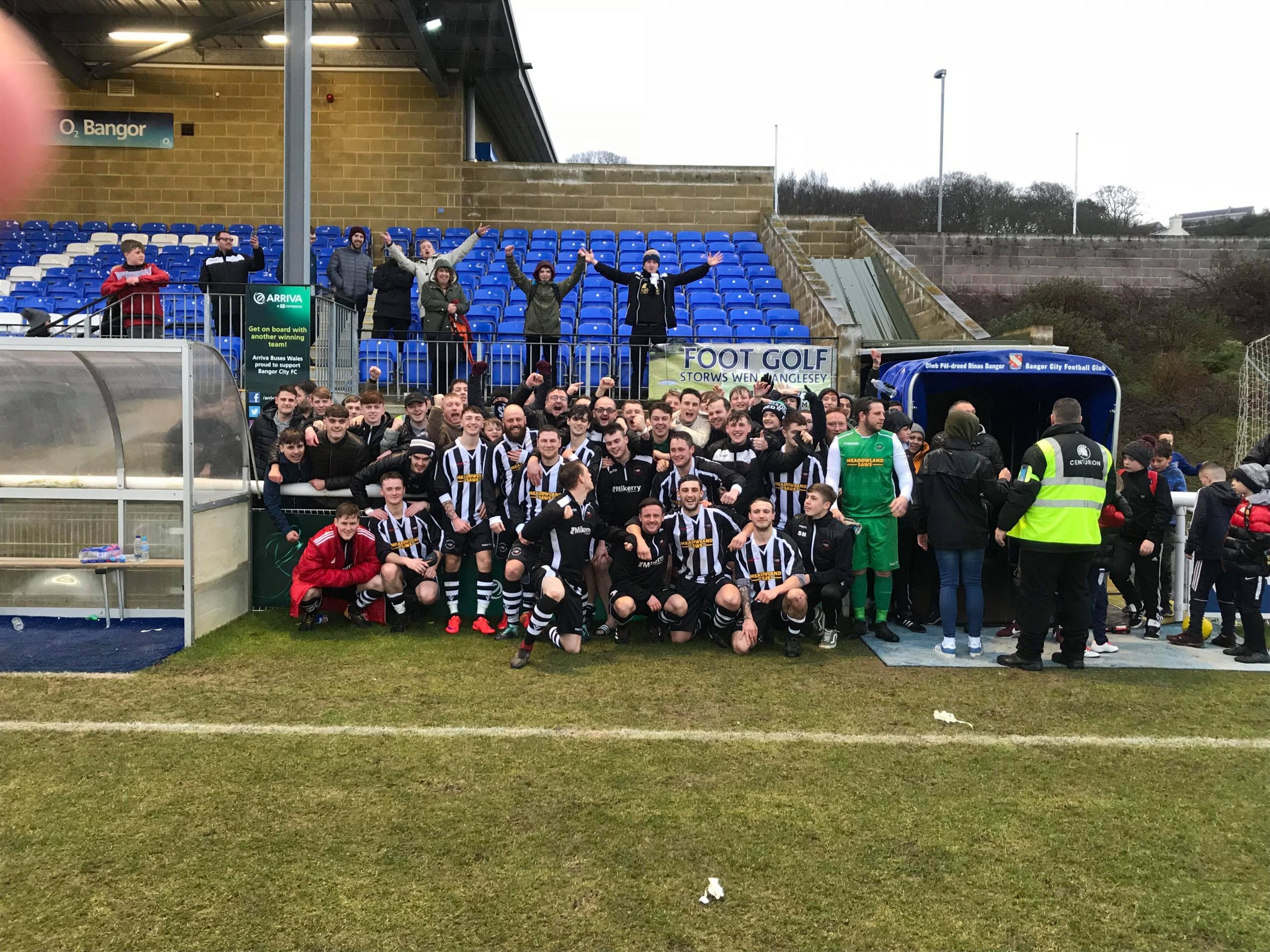 Penydarren's players and fans at Nantporth