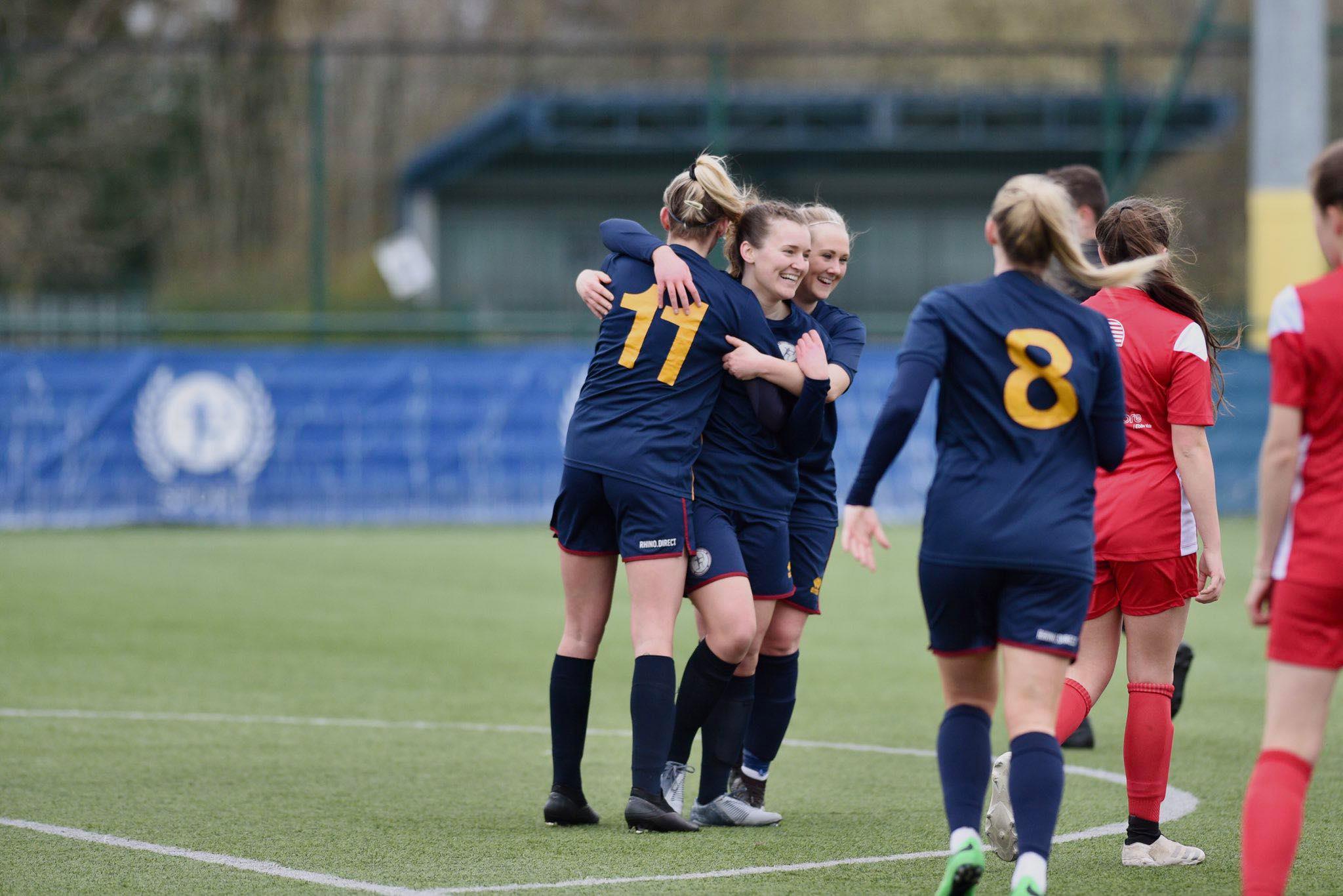 Cardiff Met celebrate their third goal against Abergavenny Women