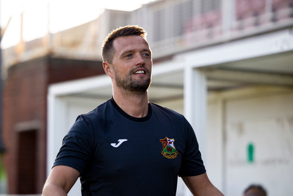 Lee John in the dugout at Llanelli Town