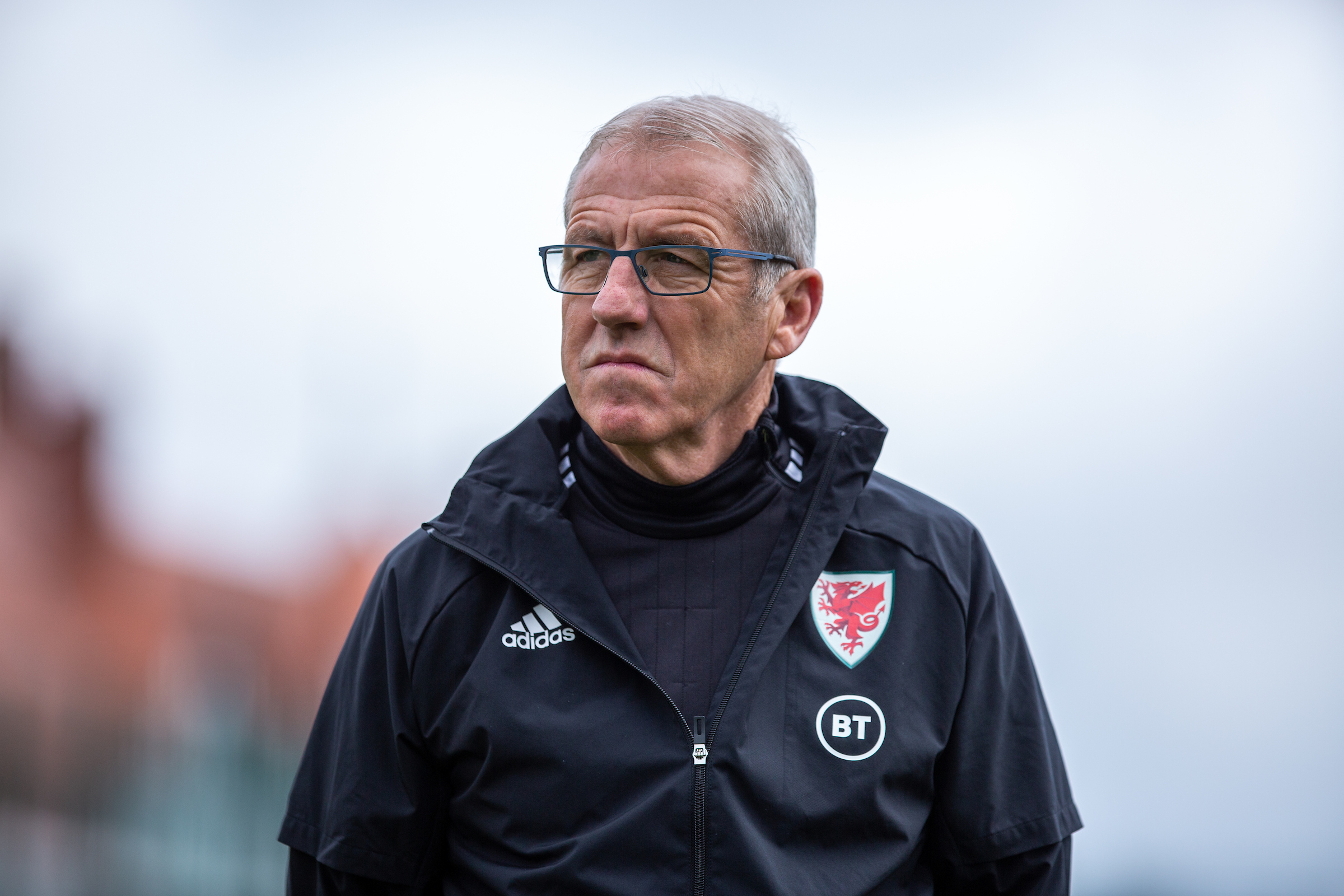 Wales C manager Mark Jones looks on in training