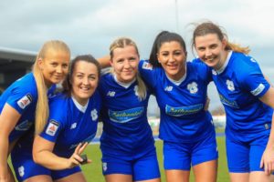 Cardiff City players pose after winning the Adran Premier title