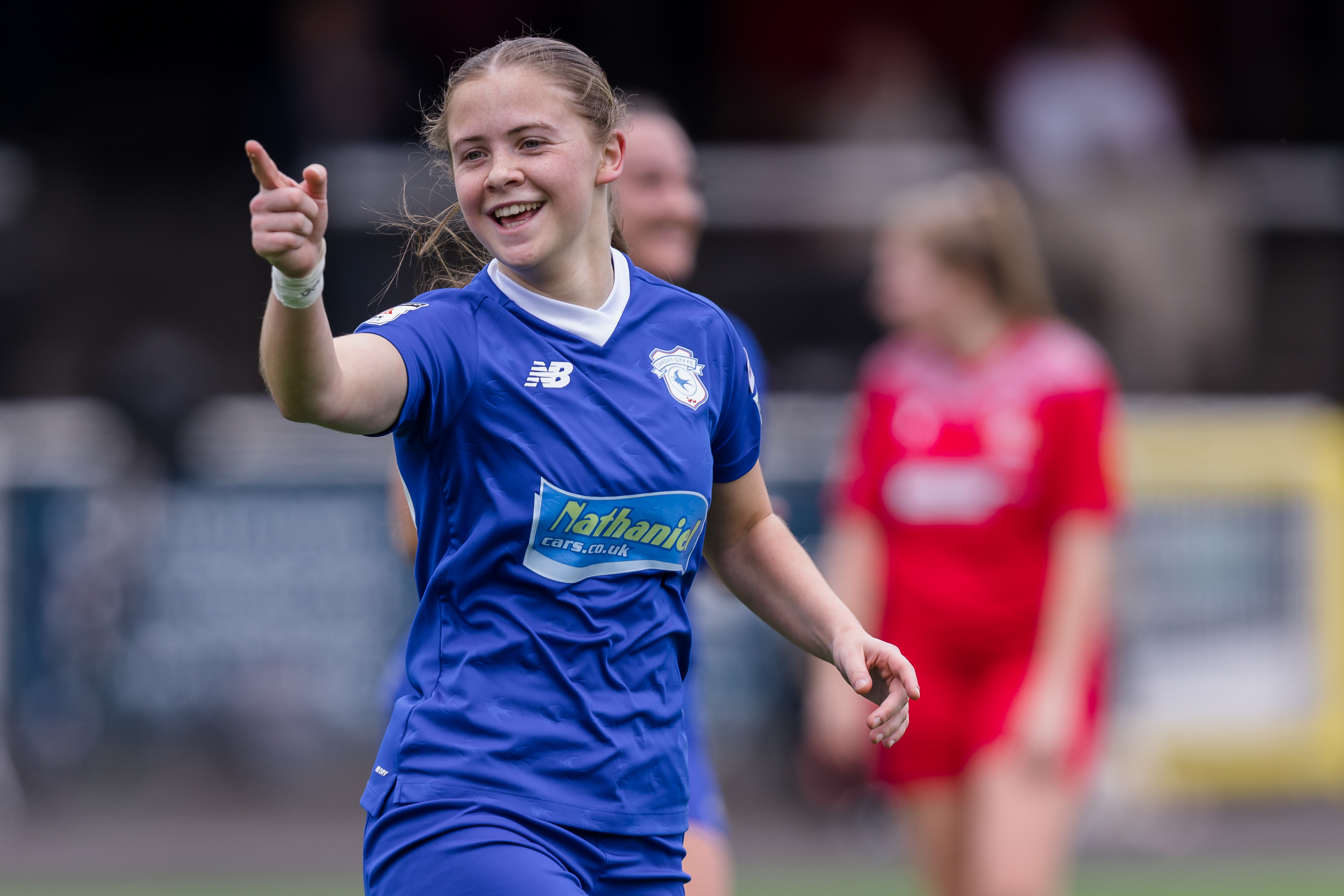 Cardiff City's Eliza Collie celebrates a goal for the Adran Premier side.