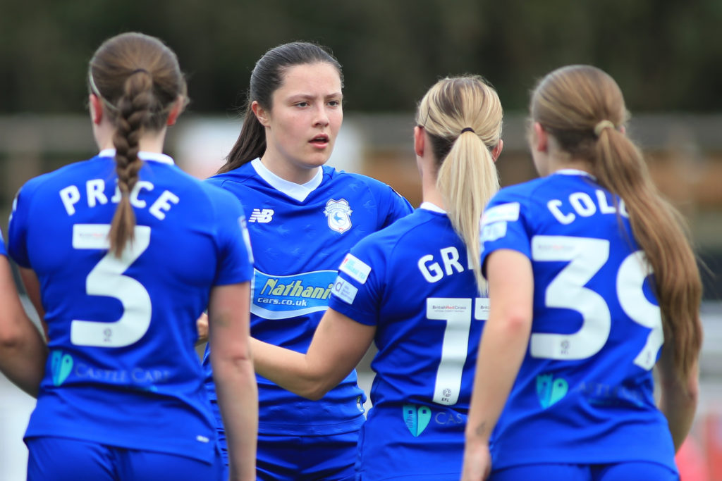 Cardiff City players celebrate scoring against Briton Ferry