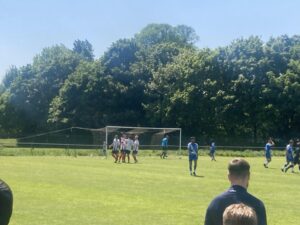 Cardiff Draconians celebrate their second goal.