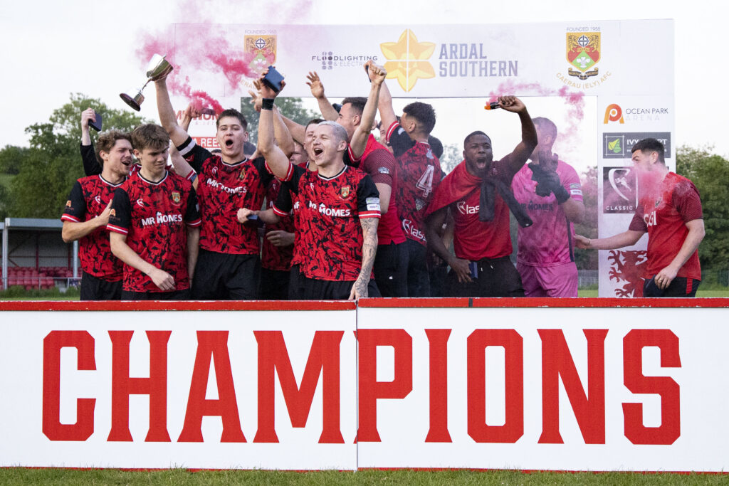 Caerau Ely celebrate promotion to the Cymru South, the second tier of Welsh football