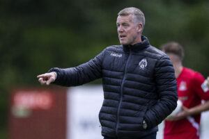 Andy Hill gives instructions on the touchline