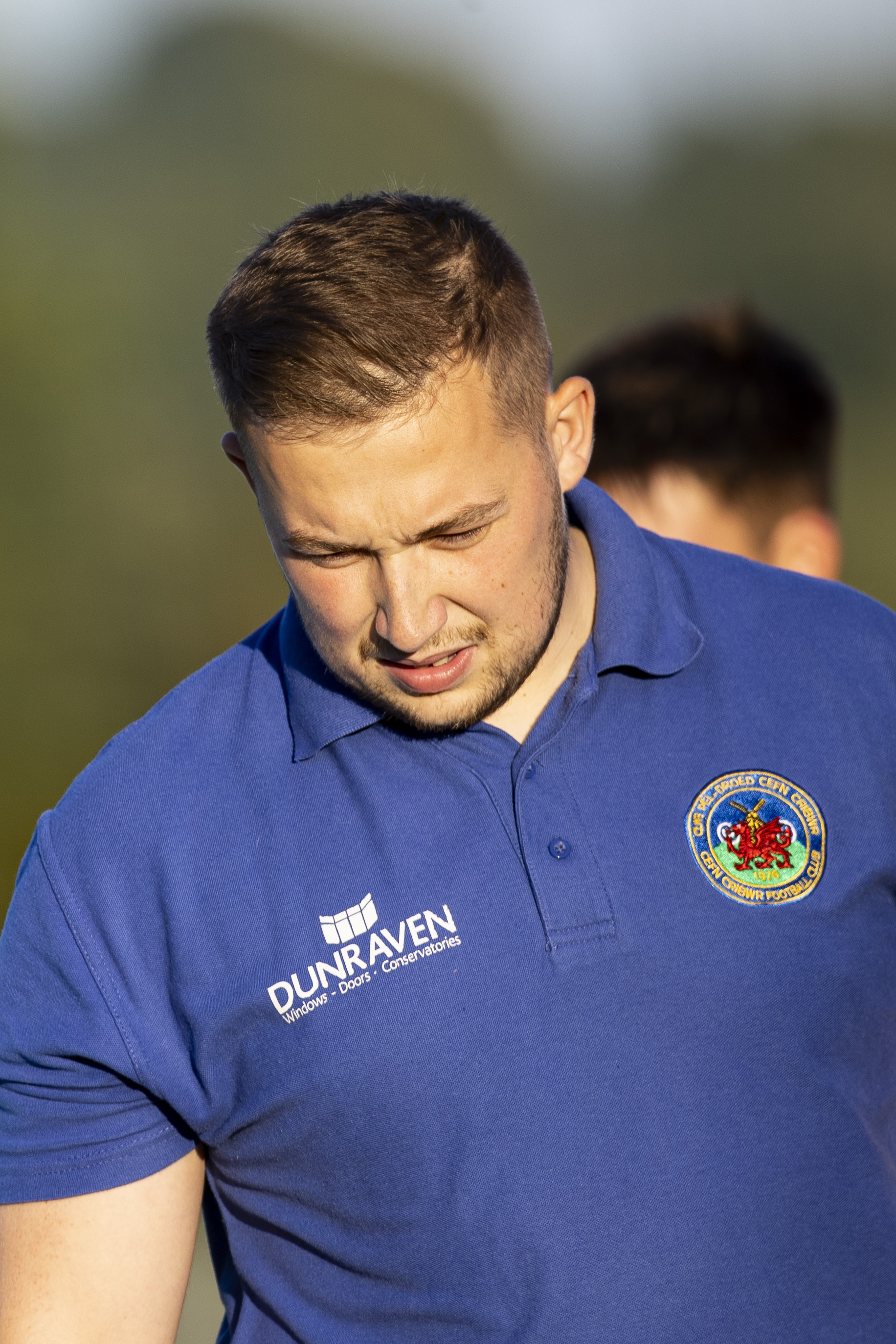 Cefn Cribwr manager Dylan Powell stands on the touchline.