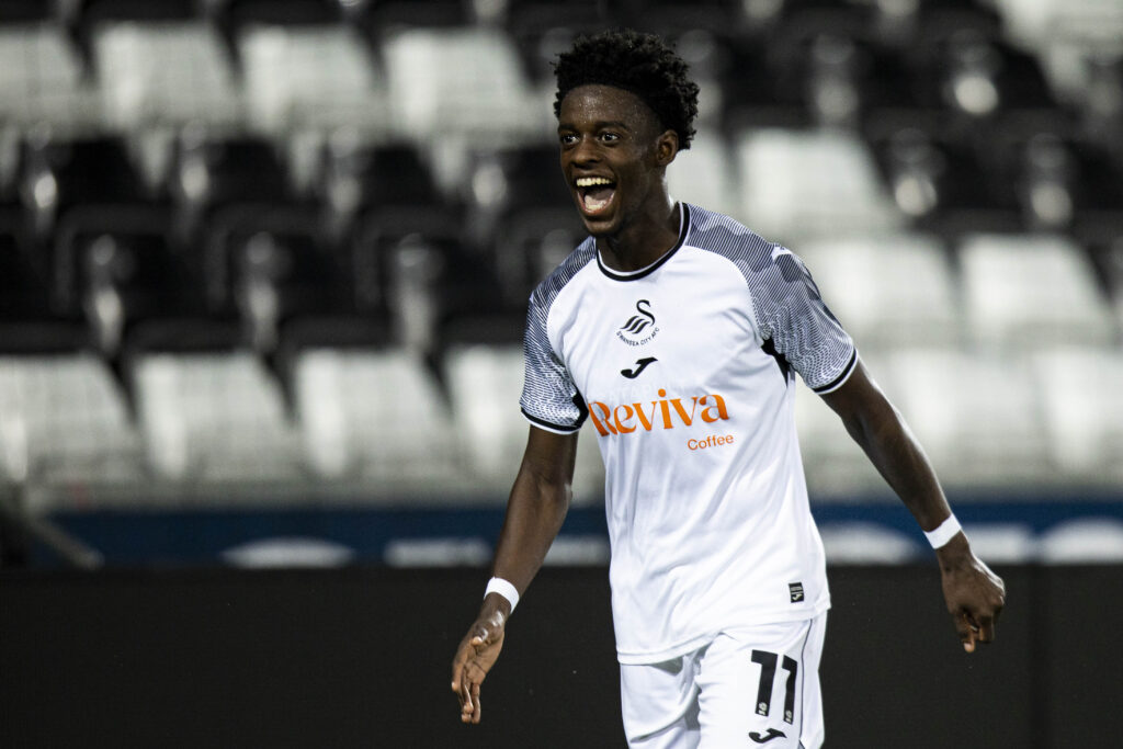 Maliq Cadogan celebrates opening the scoring for Swansea City aganst Cardiff City. 