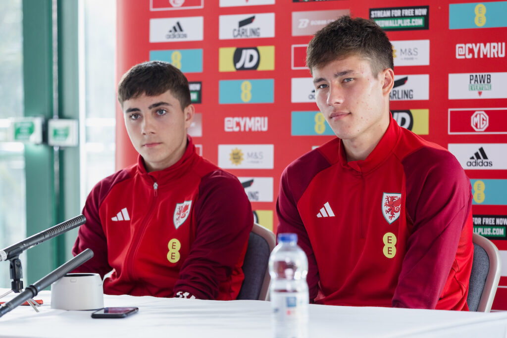 Cardiff City and Wales brothers Joel Colwill and Rubin Colwill sat aside each other at a press conference.