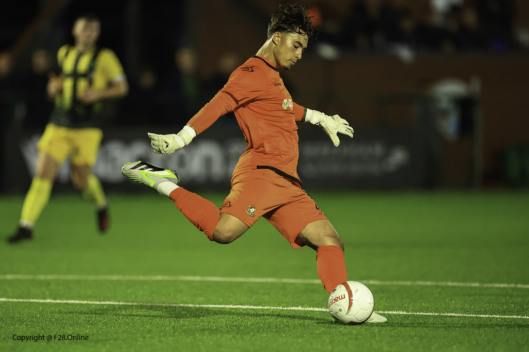 Aberystwyth Town goalkeeper Sam Green kicks a ball