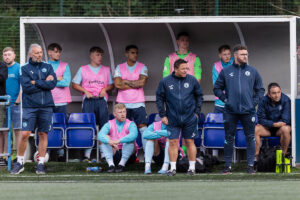 Cambrian & Clydach manager Richie Ryan watches on