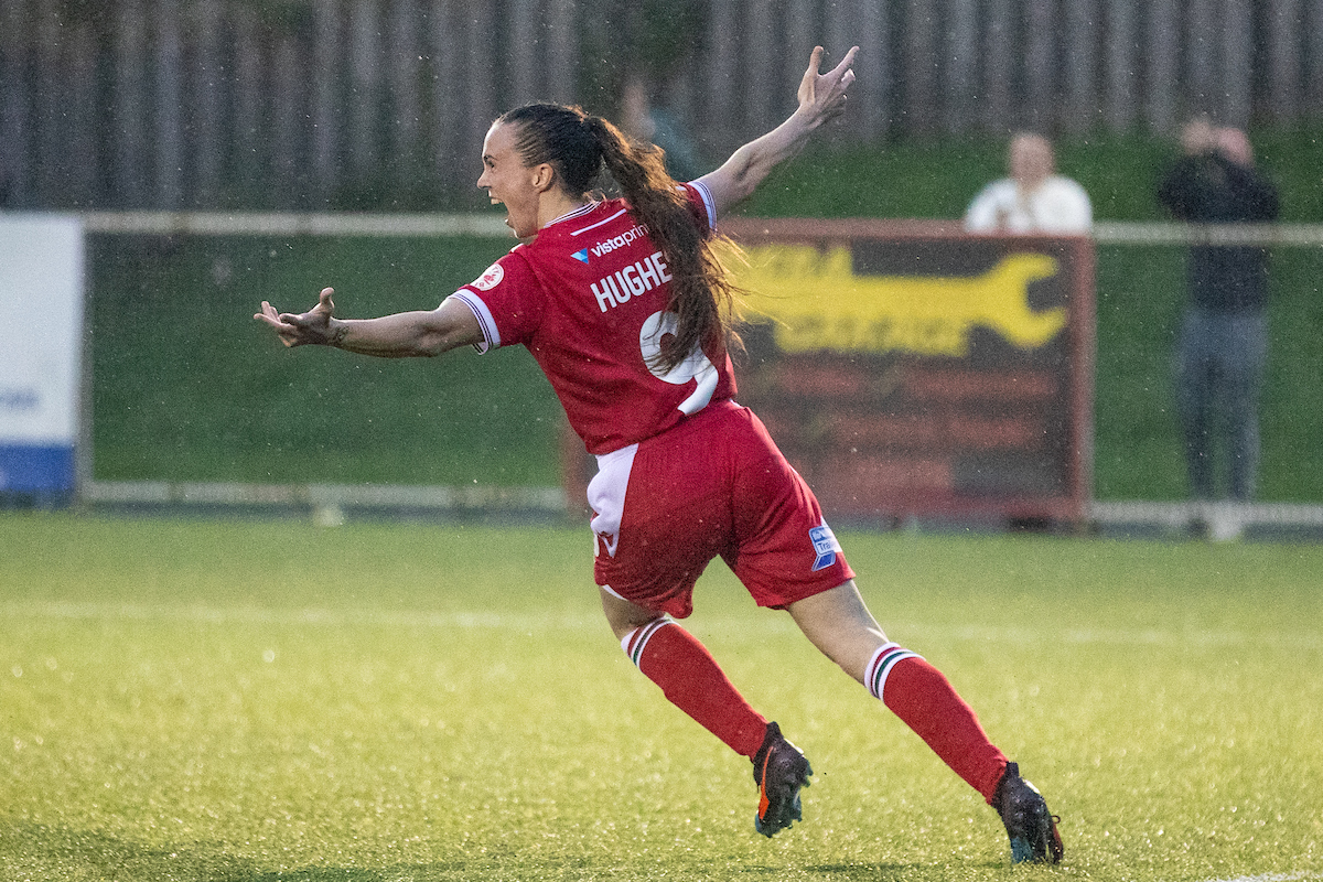 Rosie Hughes celebrates scoring a goal for Wrexham against Swansea City