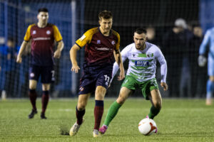 Cardiff Met player Harry Owen on the ball against TNS.