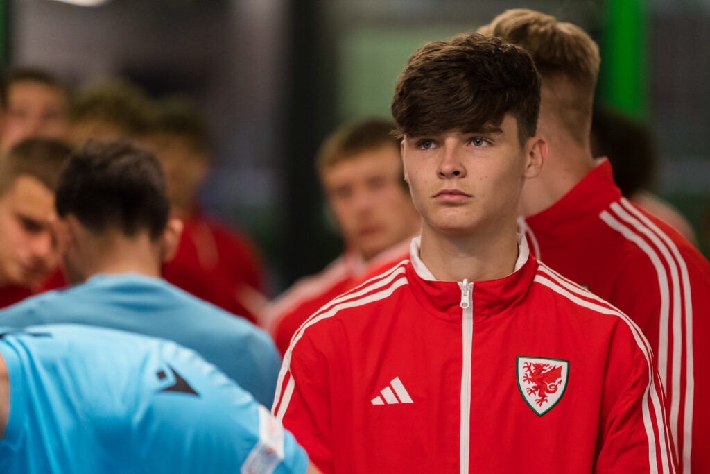 Leeds United midfielder Charlie Crew looks on whilst on international duty with Wales.