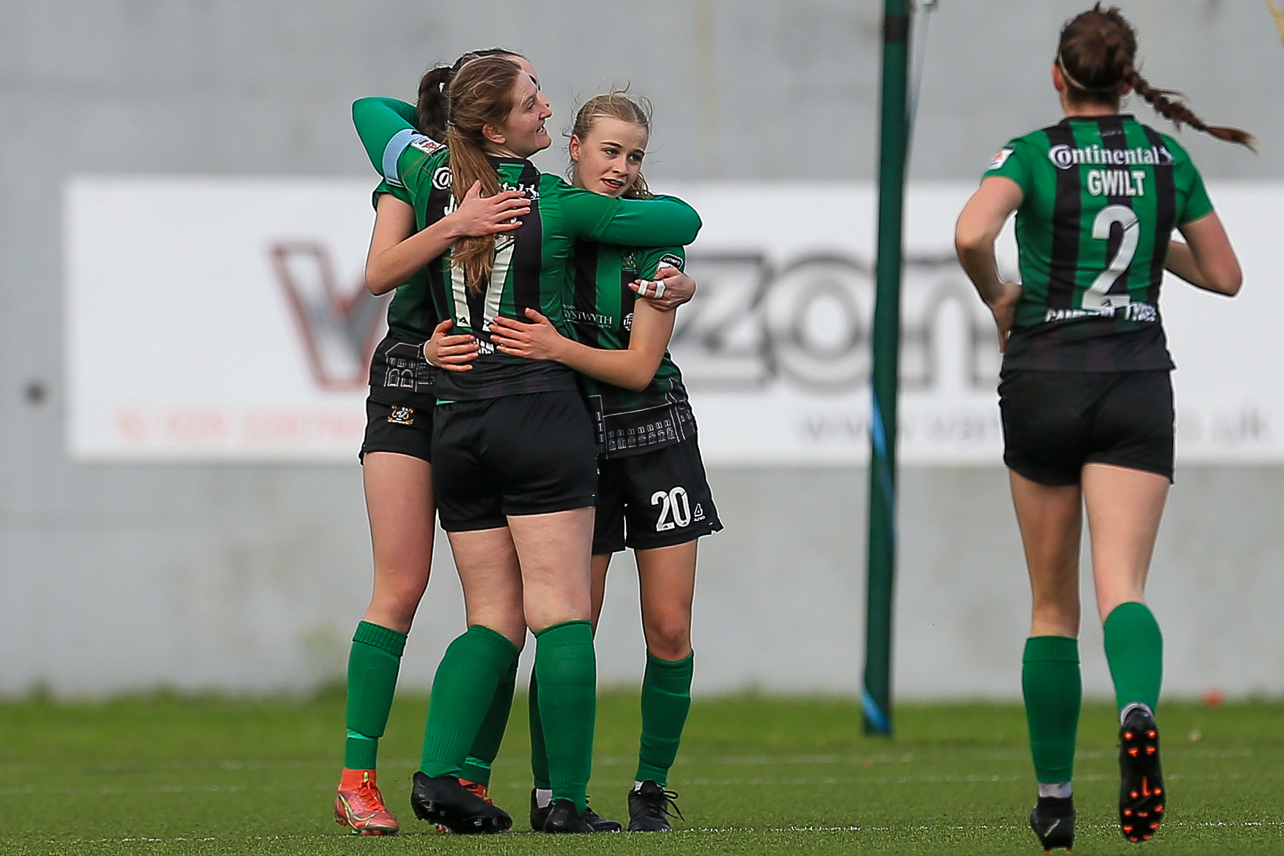 Lleucu Mathias celebrates with her Aberystwyth Town teammates.