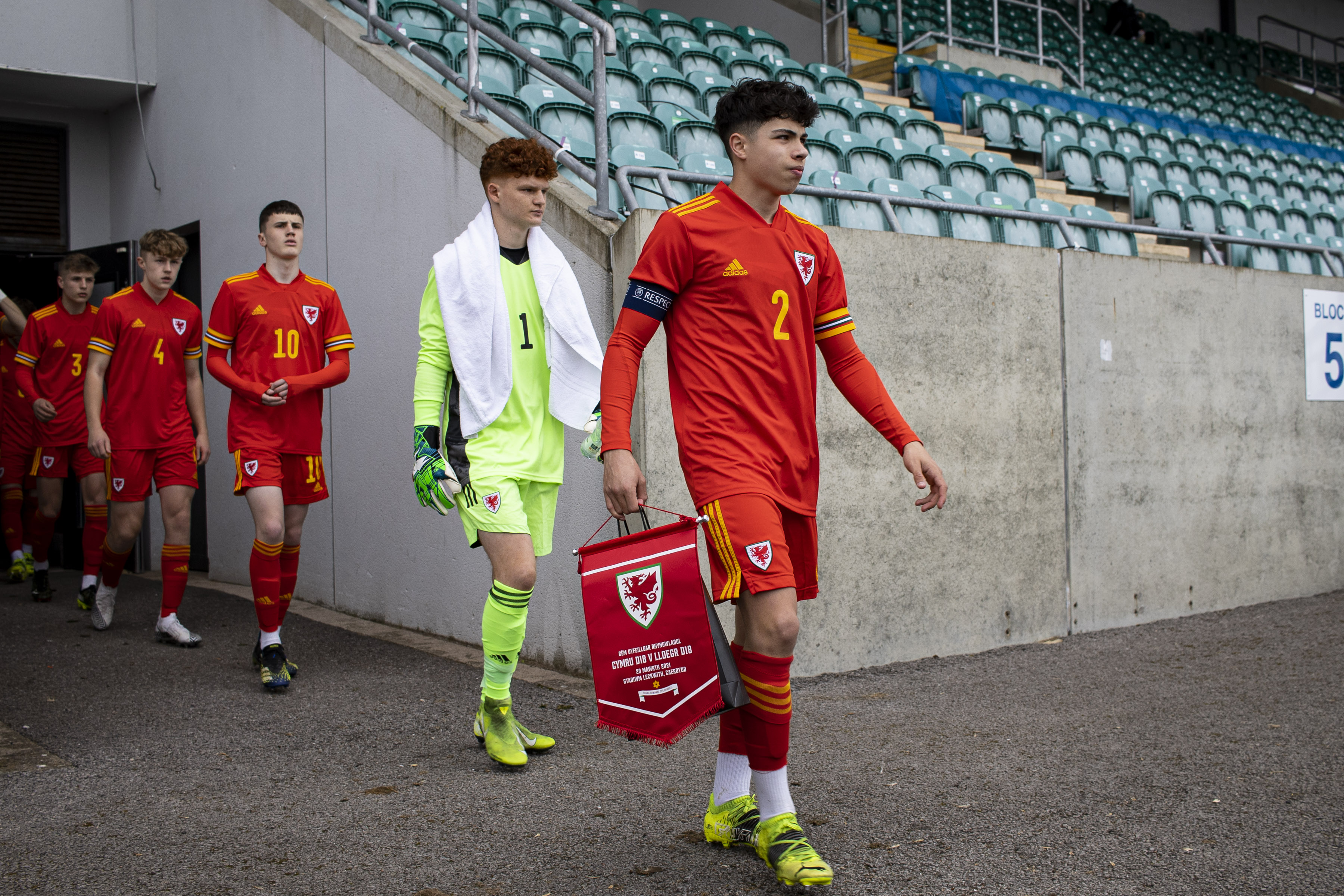 Wales captain Keelan Williams leads his teammates out at Leckwith Stadium