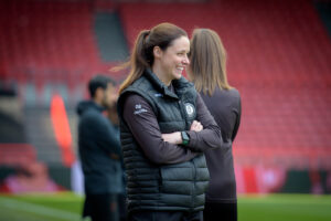 Bristol City Women's manager Lauren Smith smiles on the touch line prior to kick-off against Charlton Athletic.