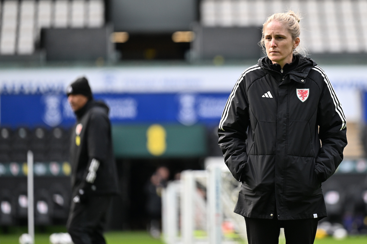 Wales manager Gemma Grainger looks on in to the distance at a training session