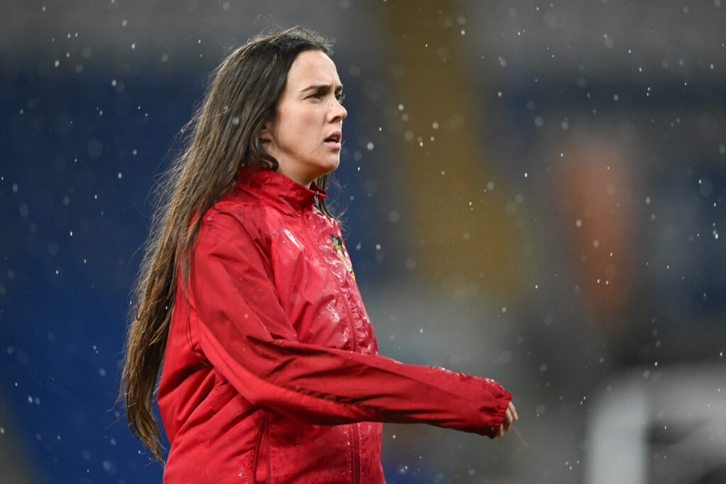 Rosie Hughes warms up  in a training session for Wrexham