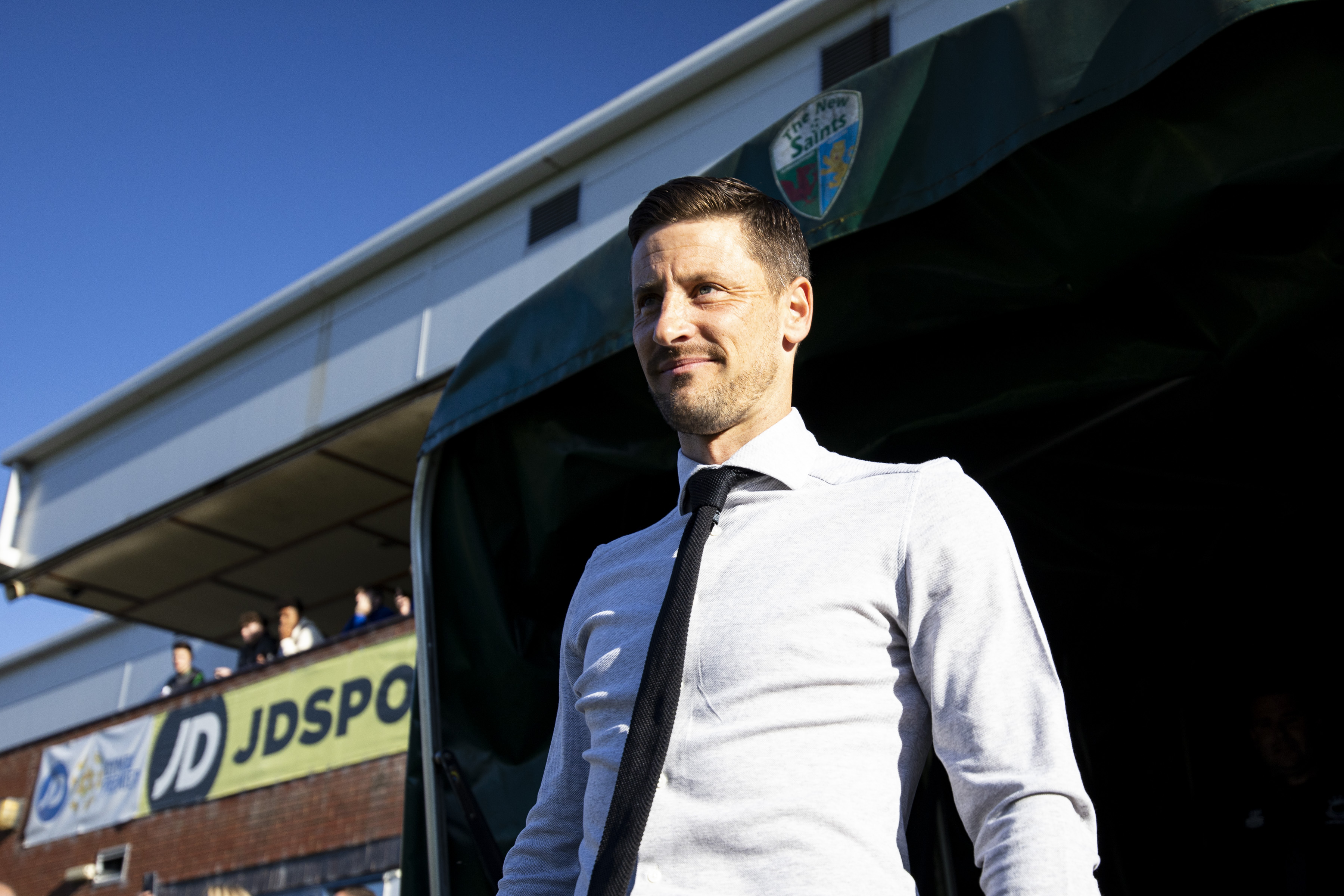 TNS manager Anthony Limbrick looks on at the Park Hall pitch.