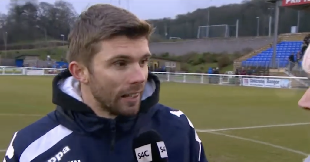 Kevin Nicholson conducts a post-match interview with Sgorio presenter Nicky John. 