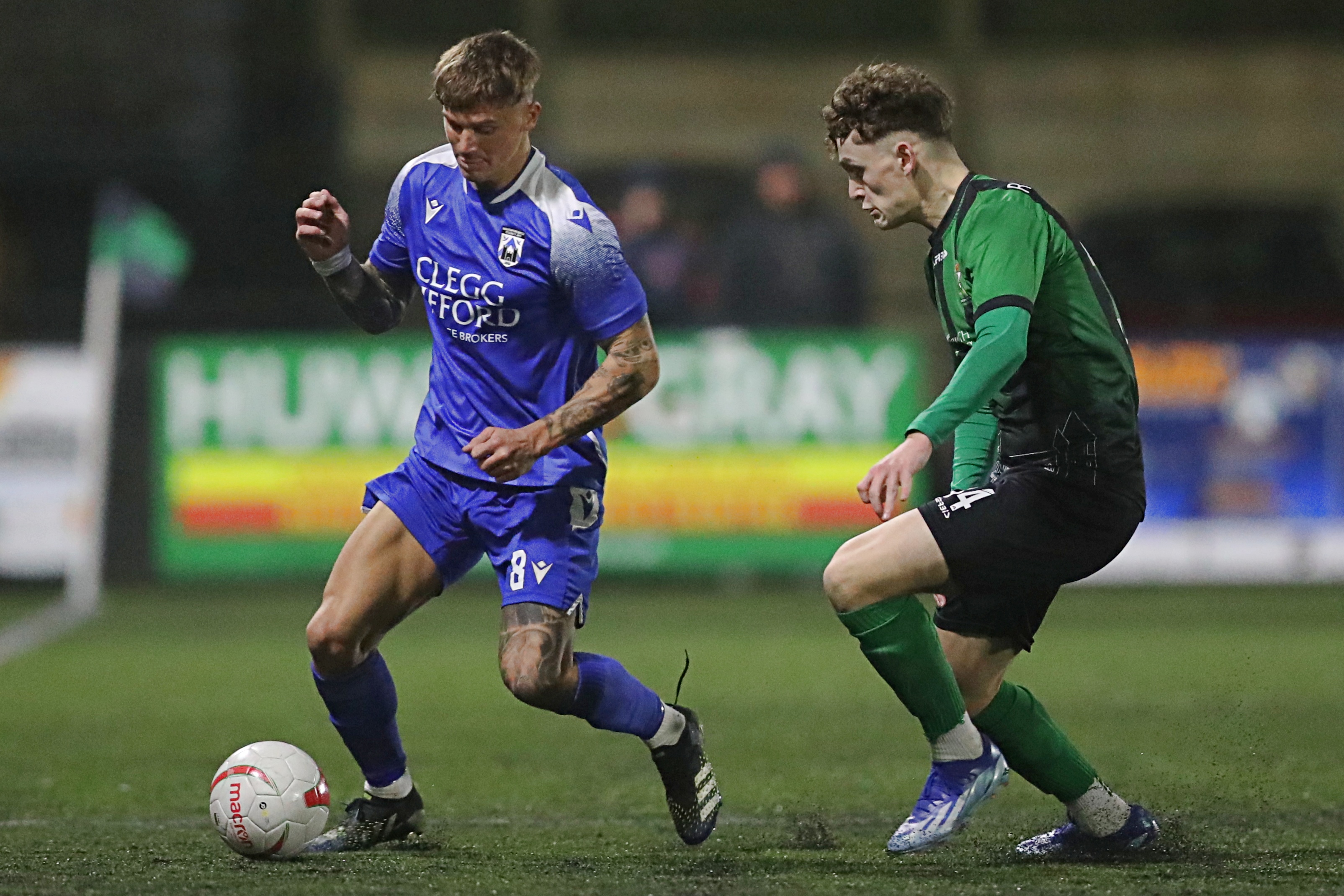 Haverfordwest County's Kai Whitmore and Billy Kirkman of Aberystwyth Town in a Cymru Premier match