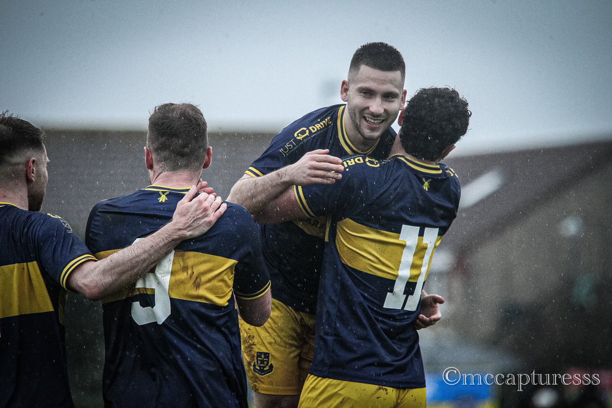 Matt Kimmins celebrates with his Llantwit Major teammates after celebrating against BK Skjold.