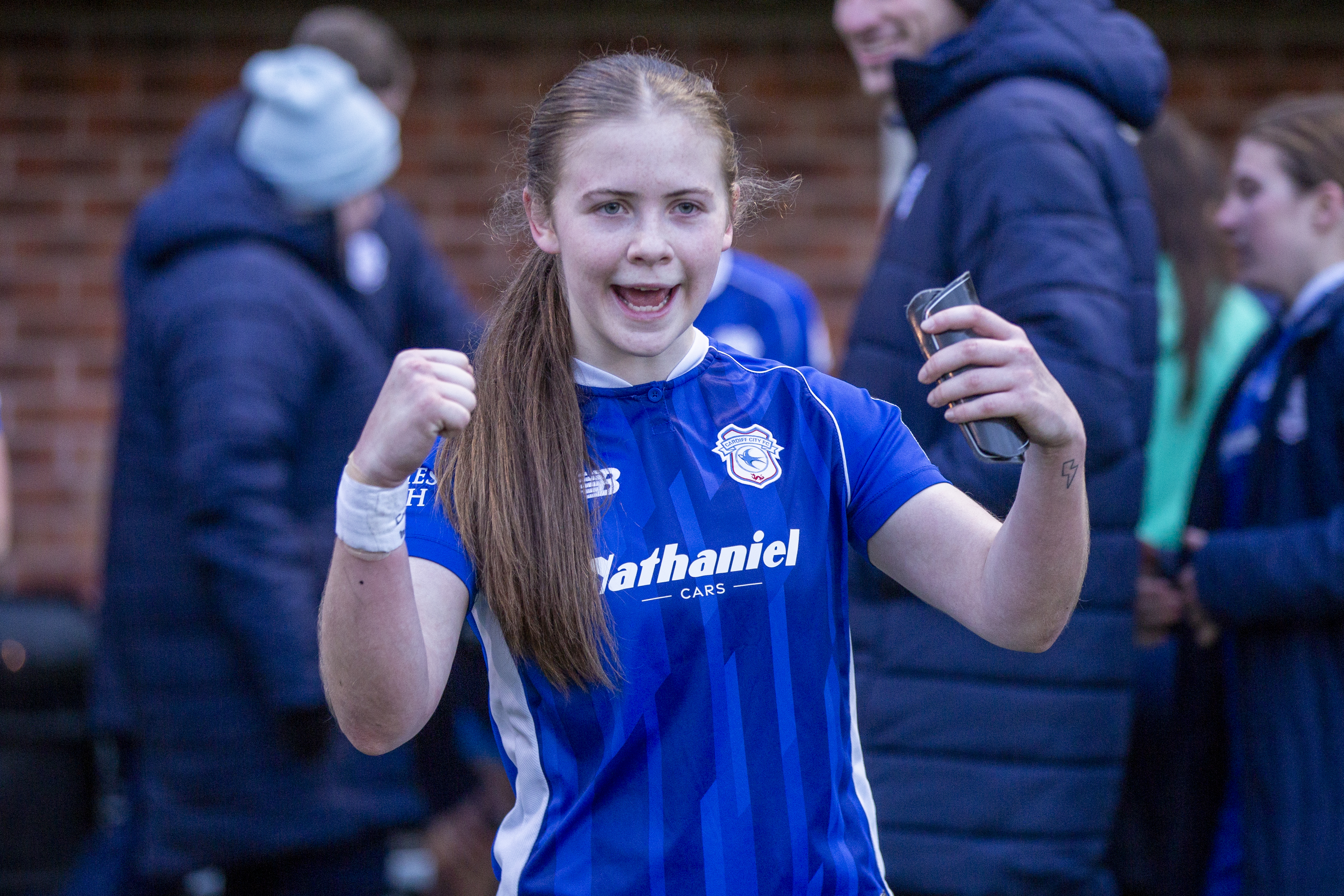 Cardiff City striker Eliza Collie celebrates at full-time against Wrexham