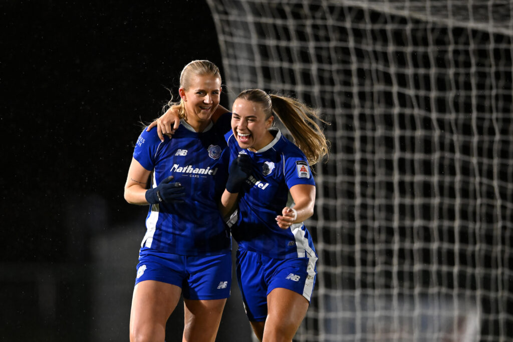 Rhianne Oakley celebrates scoring a goal for Cardiff City against Swansea City