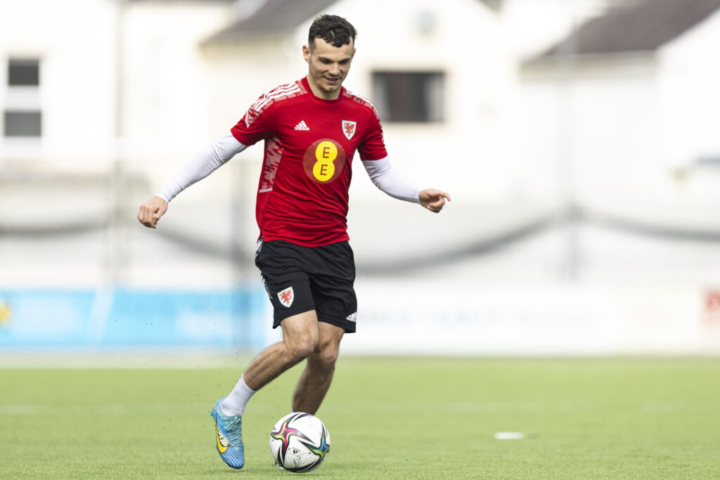 Greenock Morton striker Jordan Davies dribbles with the ball in a Wales C training session