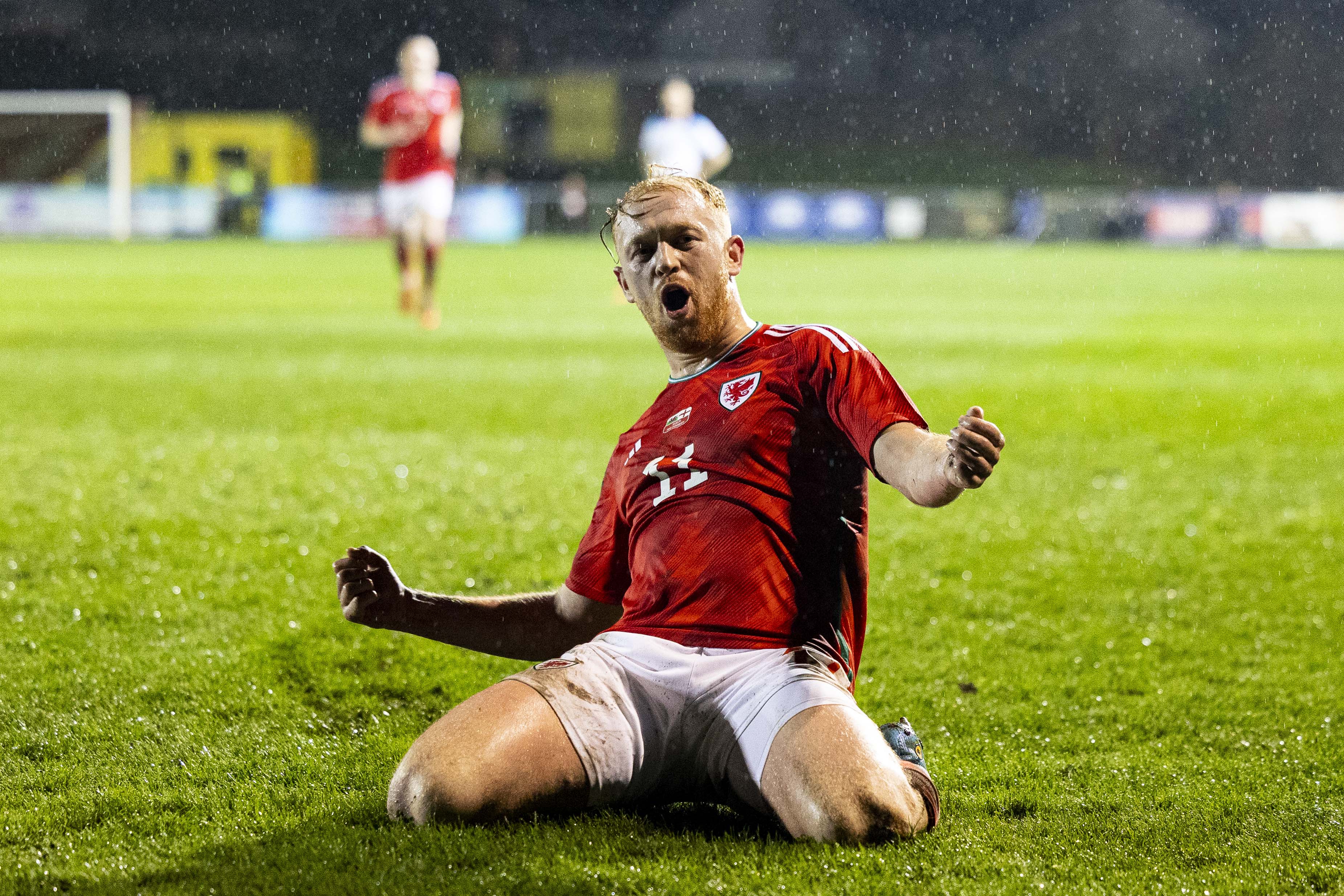 Sion Bradley celebrates scoring for Wales C against England C