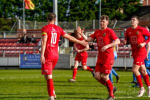 Llanelli Town celebrate a goal against Pontardawe Town