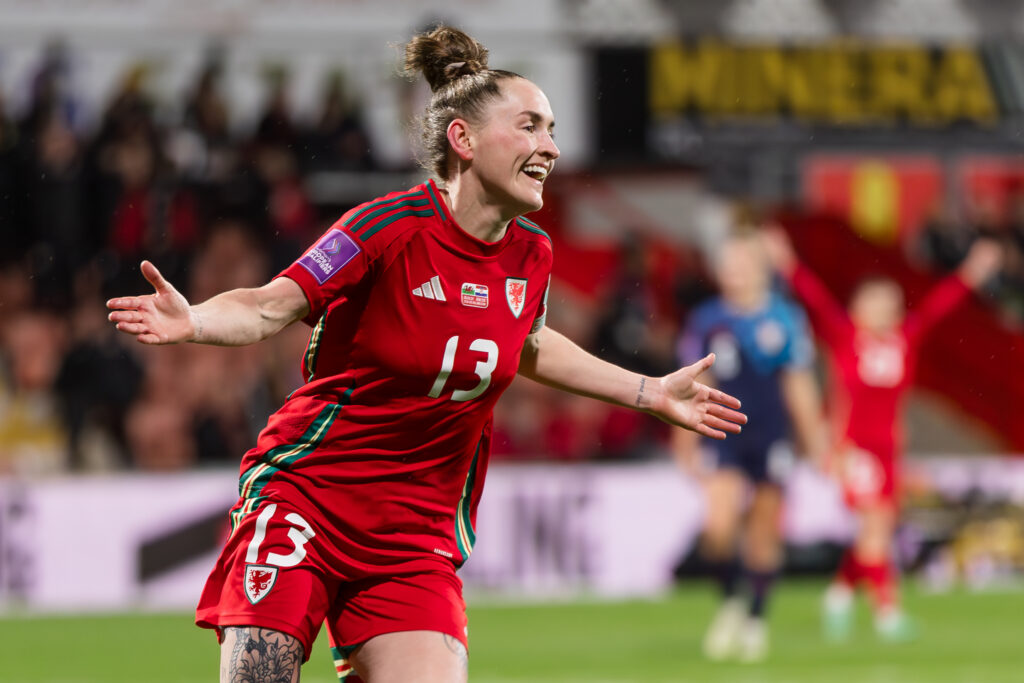 Rachel Rowe celebrates scoring a goal for Wales against Croatia.