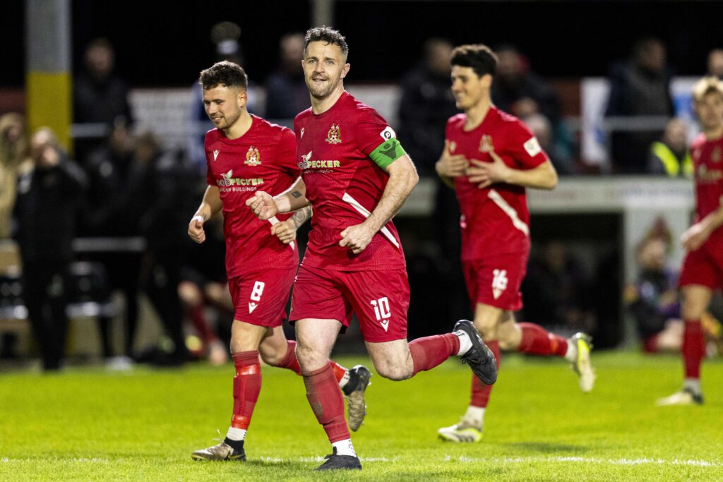 Luke Bowen celebrates scoring his fourth goal for Briton Ferry