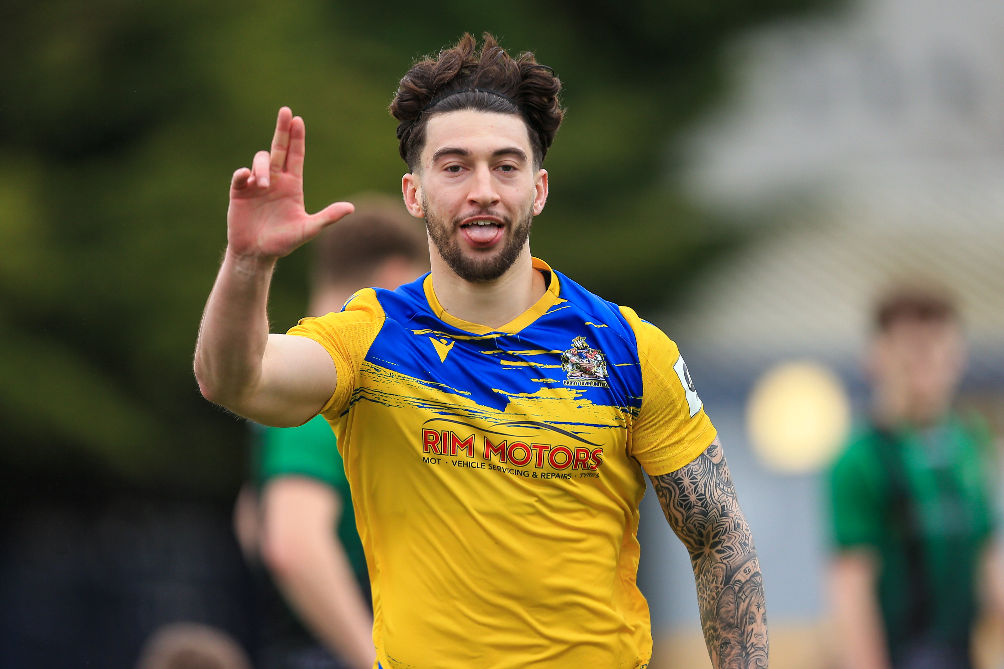 Ollie Hulbert celebrates scoring for Barry Town against Aberystwyth