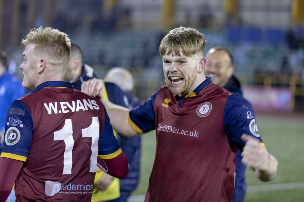 Emlyn Lewis celebrates after Cardiff Met win the Nathaniel MG Cup in 2019