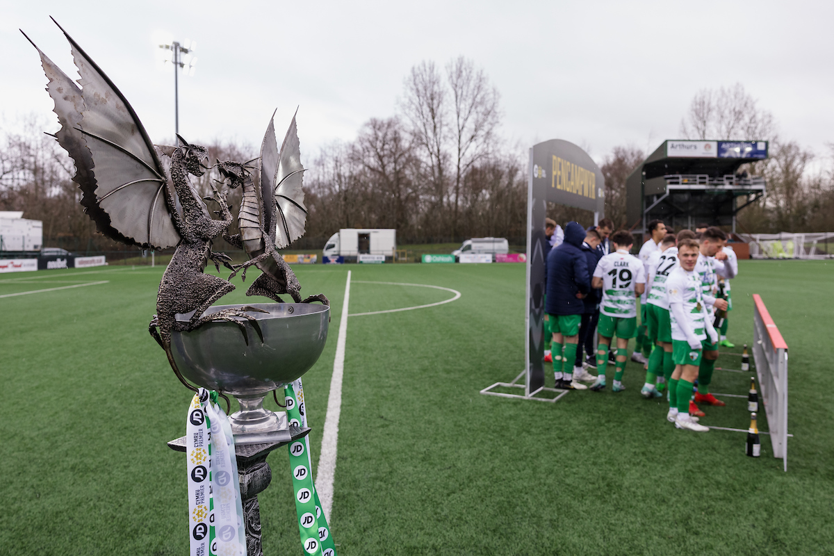 TNS players get ready to lift the Cymru Premier trophy