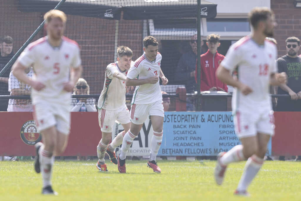 Haci Ozlu celebrates after scoring for the Cymru North against the Cymru South in the UEFA Regions Cup