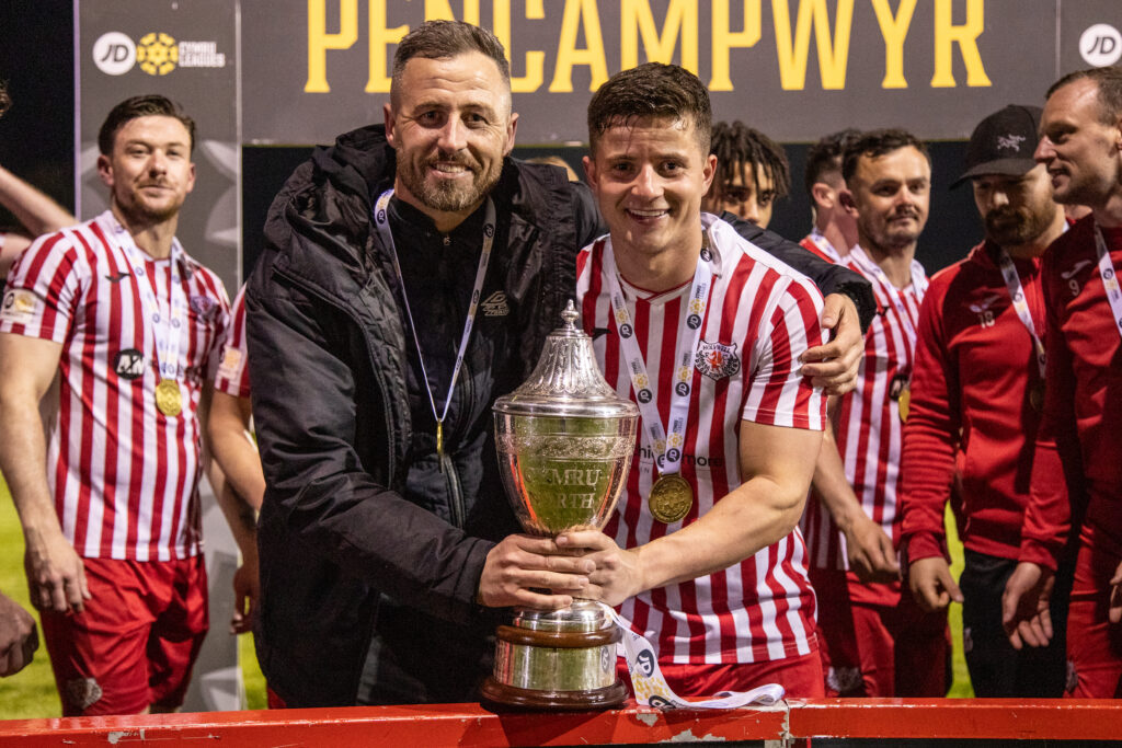 John Haseldin poses with the Cymru Leagues North trophy