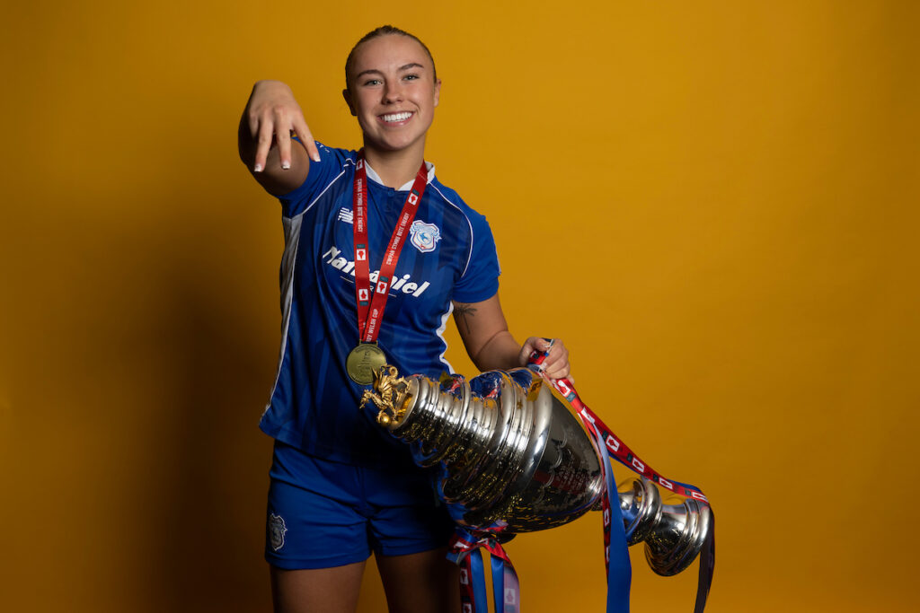 Cardiff City's Seren Watkins poses with the FAW Women's Cup