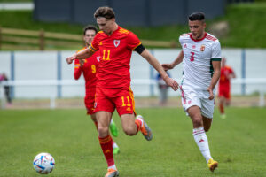 Penybont striker James Crole in action for Wales U19