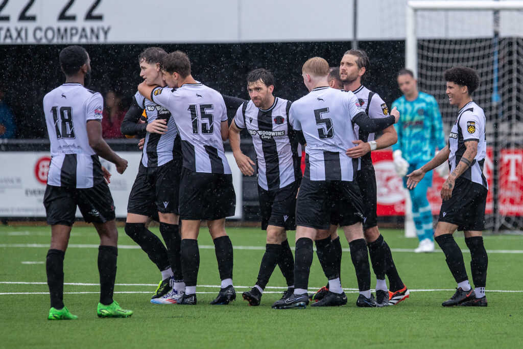 Llandudno players celebrate their opening goal during the Nathaniel MG Cup First Round fixture between Llandudno and Newport County at the Go Goodwin’s Stadium, Llandudno, Wales (Pic