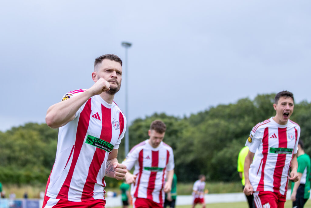 Holywell Town's Jamie Breeze scores his second goal of the game during the JD Cymru North fixture between Holywell Town and Prestatyn Town at the Bartons North Wales Stadium, Holywell, Wales. 