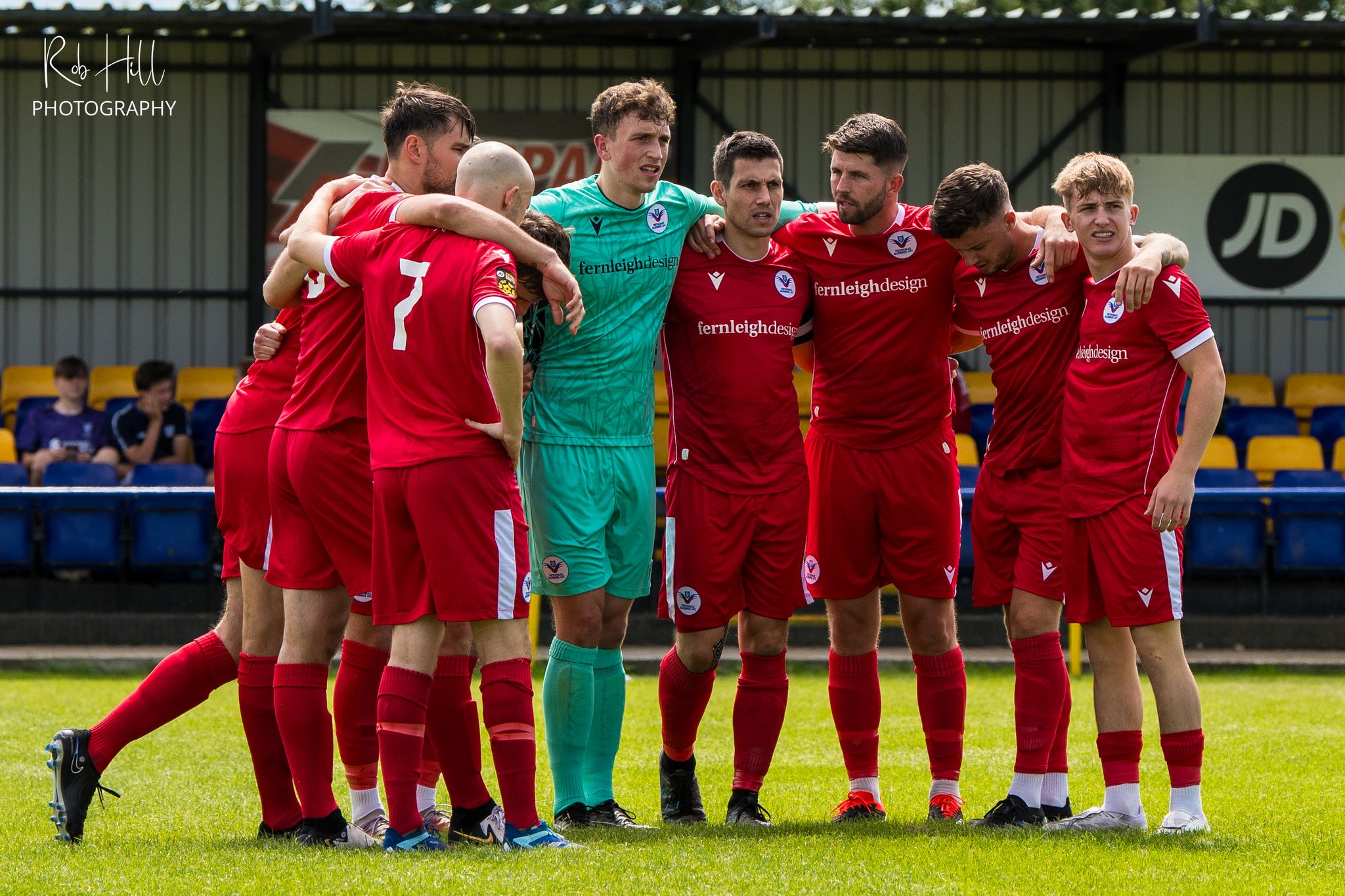 Trethomas Bluebirds in a huddle ahead of their Cymru South game against Llantwit Major.