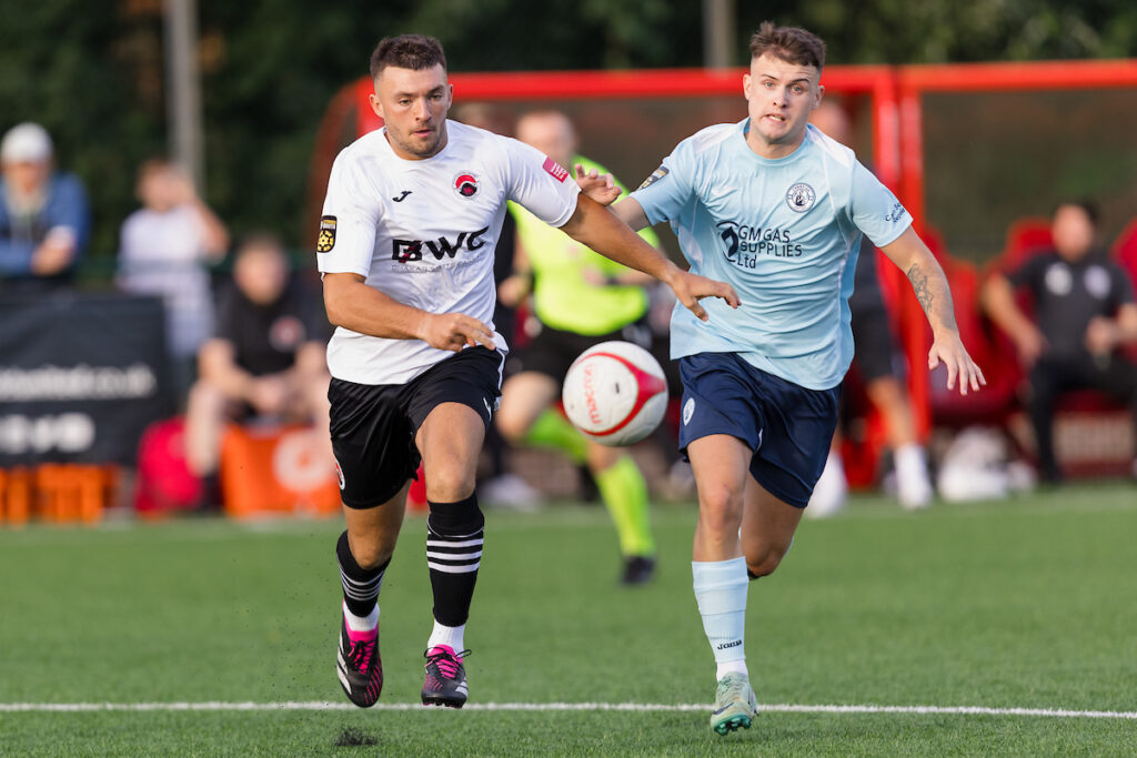 Pontypridd's Liam Eason and Cambrian United Jack Fox during the 2024/25 JD Cymru South fixture between Pontypridd United F.C & Cambrian United F.C at USW Sports Park, Treforest, Wales