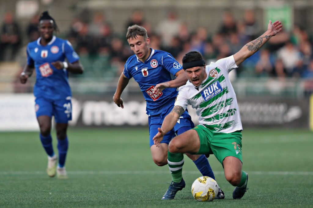 Panevezys' Rokas Rasimavicius fouls TNS' Adrian Cielsewicz during The New Saints vs FK Panevezys in the UEFA Europa Conference League Playoff Second leg at Park Hall, Oswestry